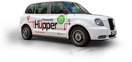 Ein Auto mit "Hüpper"-Schriftzug
