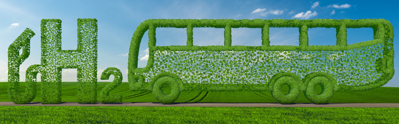 Ein Bus und der Schriftzug 'H2' aus grünen Blättern geformt
